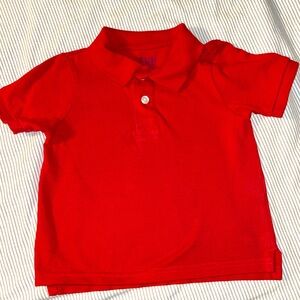 Red polo uniform shirt